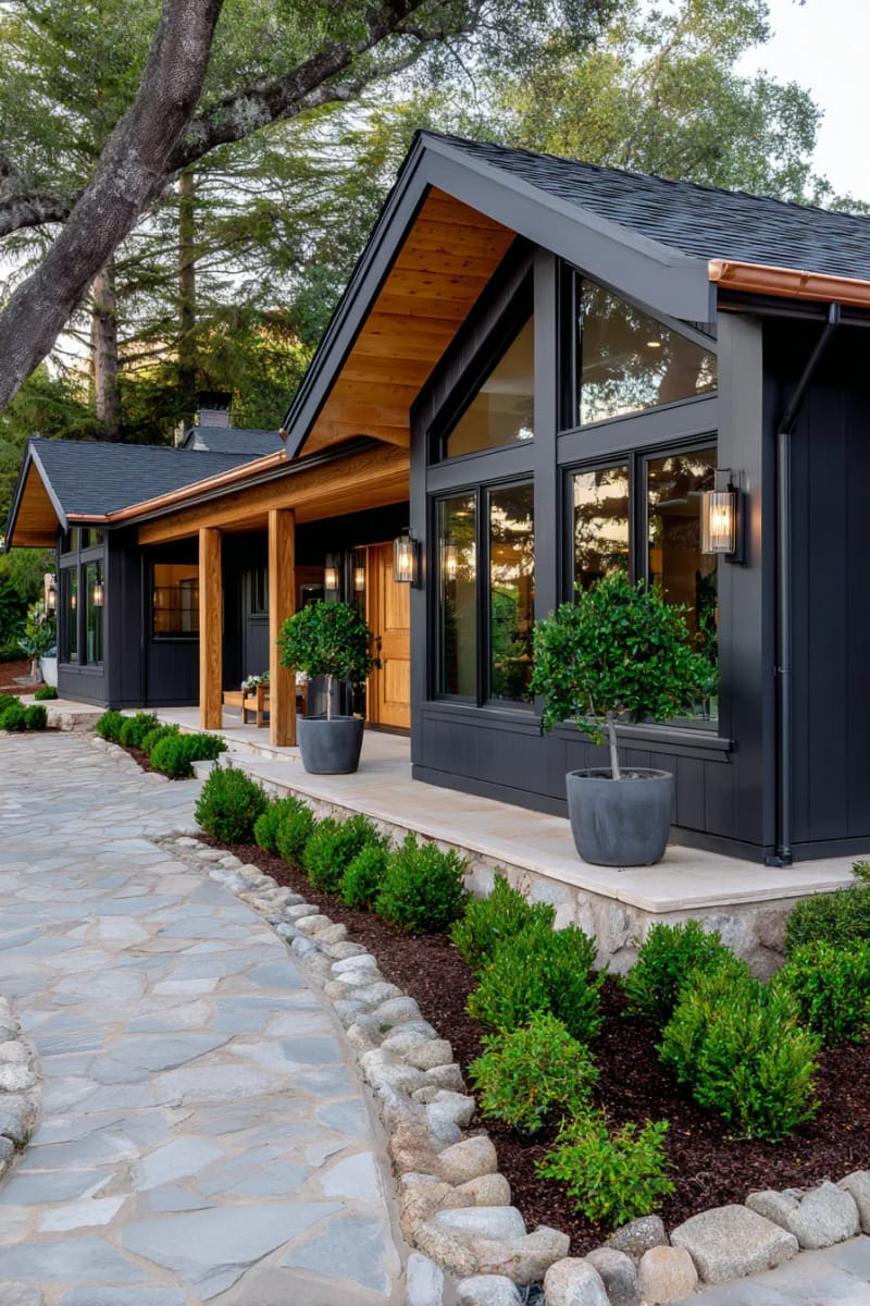 charcoal gray ranch home with copper gutter detailing 1