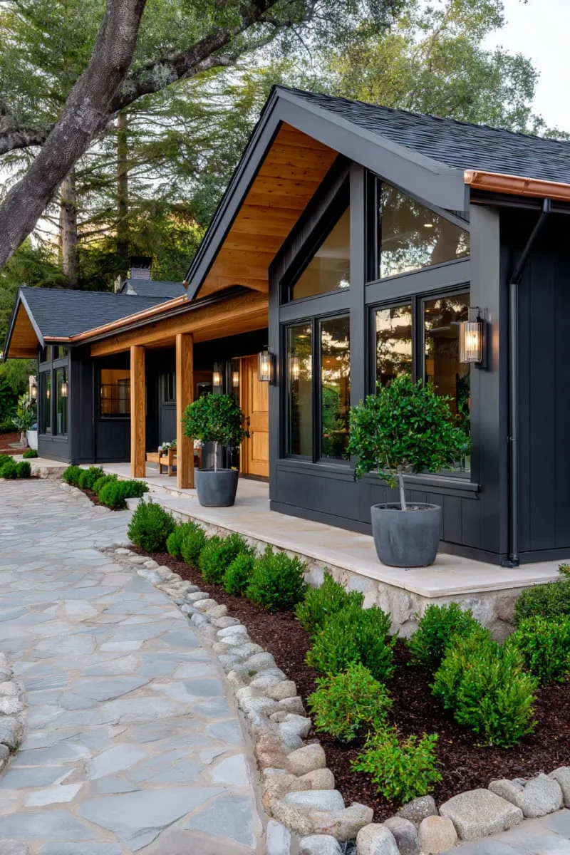 19 Ranch Style Home Exteriors to Inspire Your Next Makeover 74 charcoal gray ranch home with copper gutter detailing 1