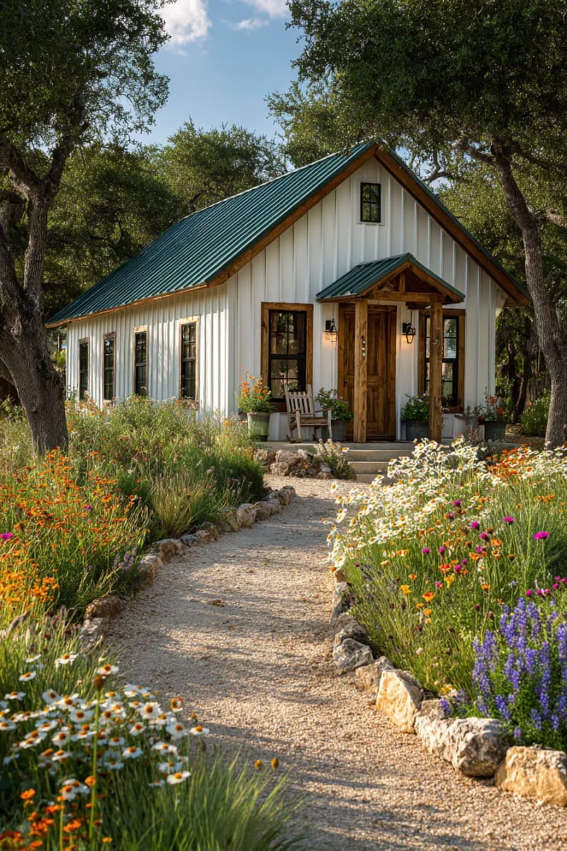 colorful wildflower garden lining a gravel pathway to the entrance 1