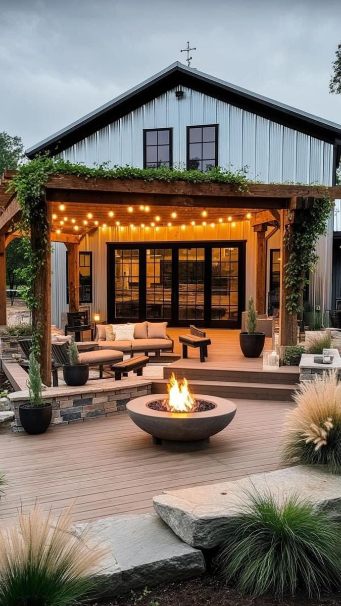 expansive outdoor living deck with built-in fire pit and pergola 1