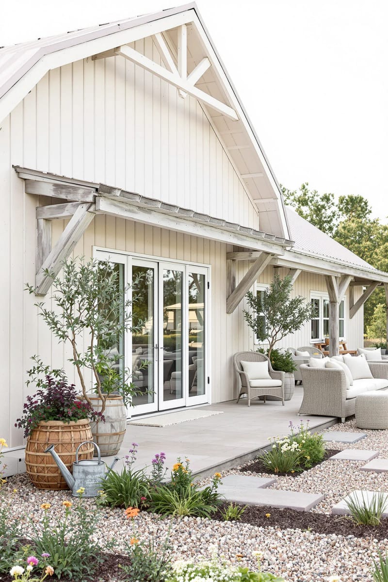 21 Small Barn House Designs with Modern Rustic Charm 56 light-toned barn home with large overhang and patio 1