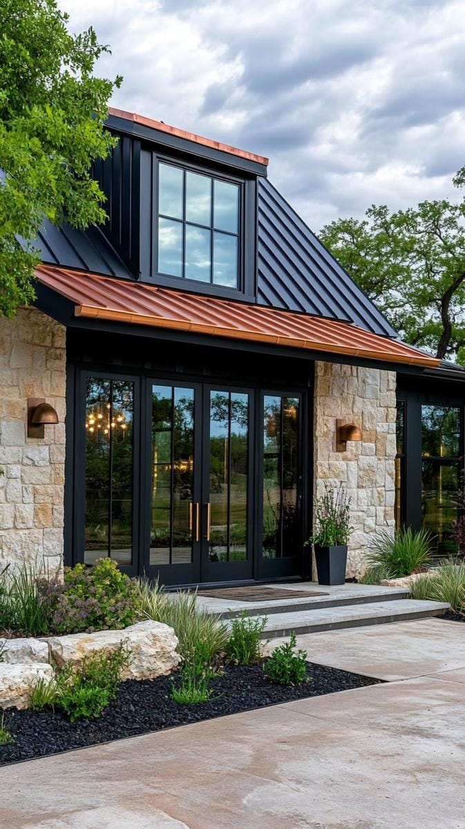 moody charcoal exterior highlighted by copper gutters and hardware 1