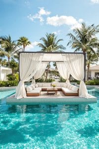 sunken seating pool cabana surrounded by water for a floating effect 41