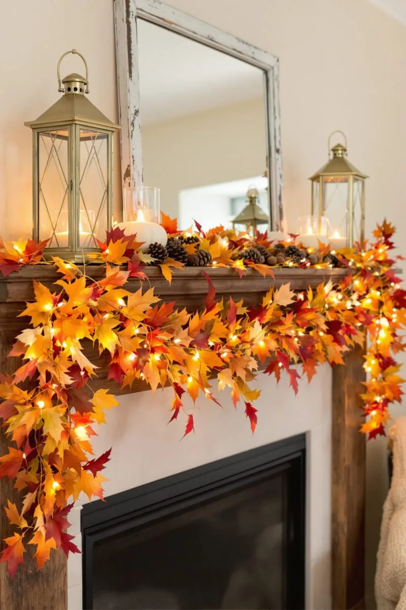 autumn leaf garland cascading down the sides with twinkling fairy lights 1