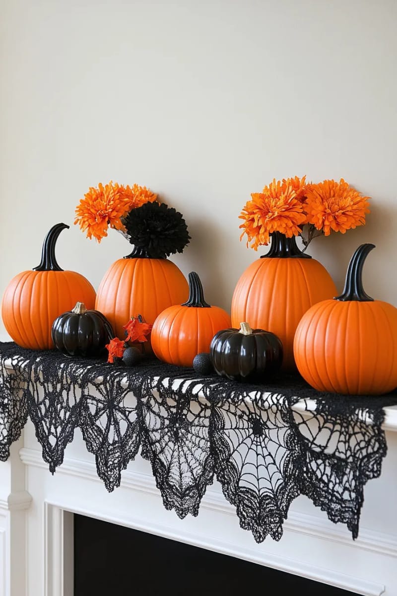black spiderweb lace draped over the mantle, with orange pumpkin vases 1
