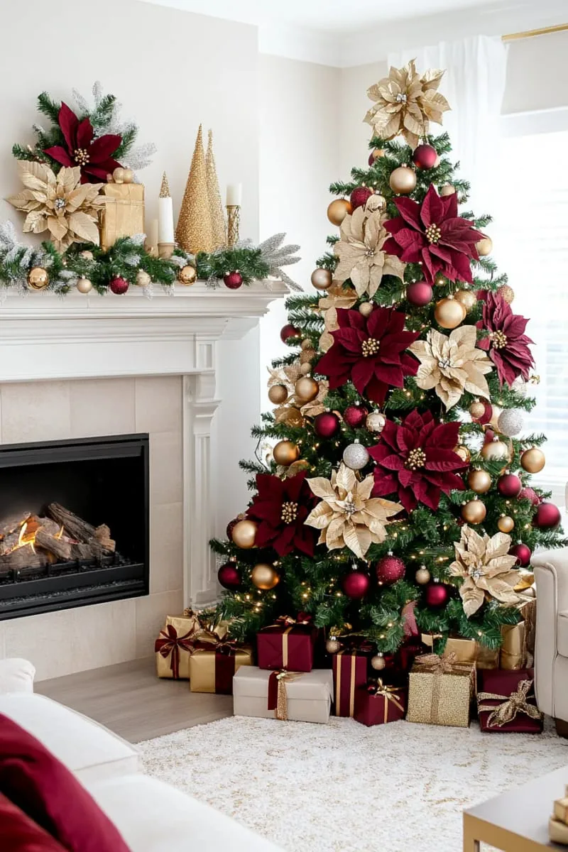 31 Dreamy Christmas Tree Decorations for a Unique Festive Touch 7 burgundy and gold baubles paired with oversized metallic poinsettia blossoms 1