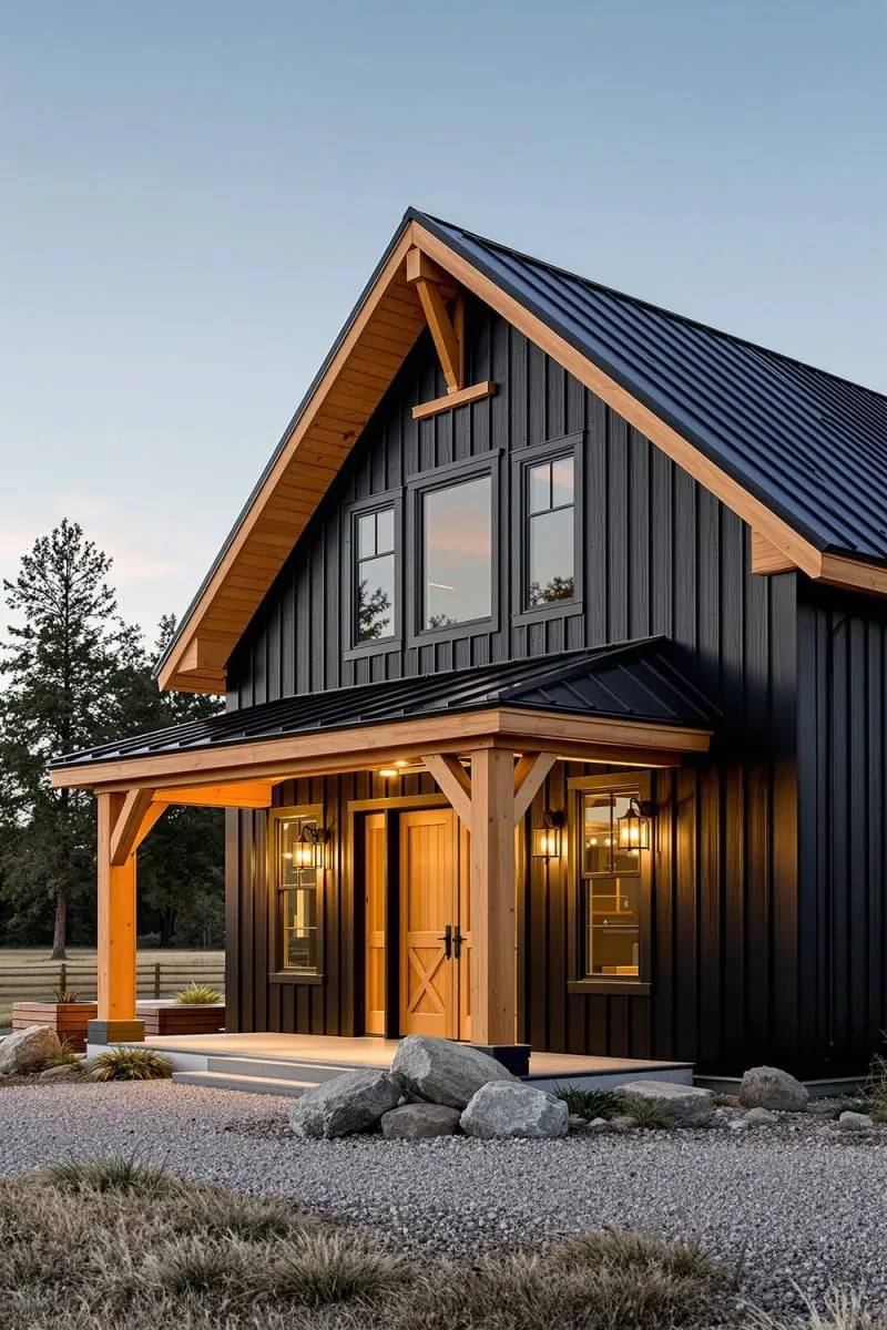classic black barndominium with cedar wood accents and metal roof 1
