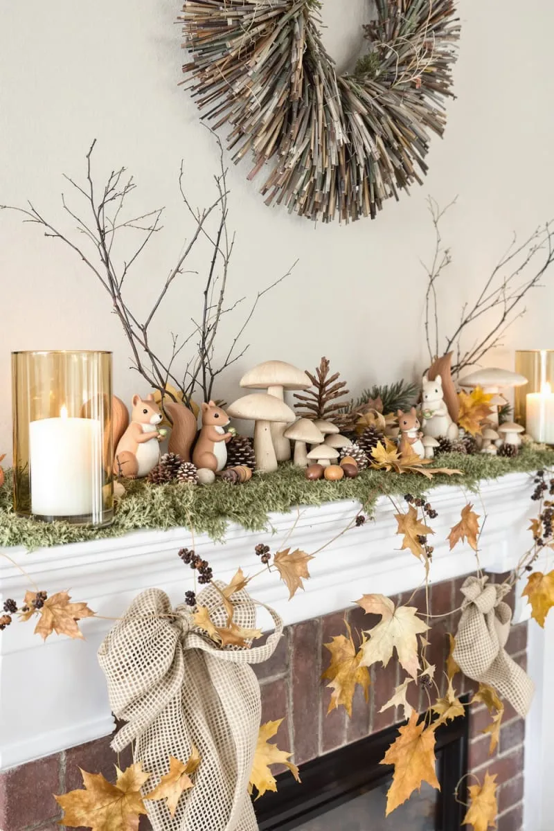 cozy woodland theme with moss, wooden mushrooms, and squirrel figurines 1