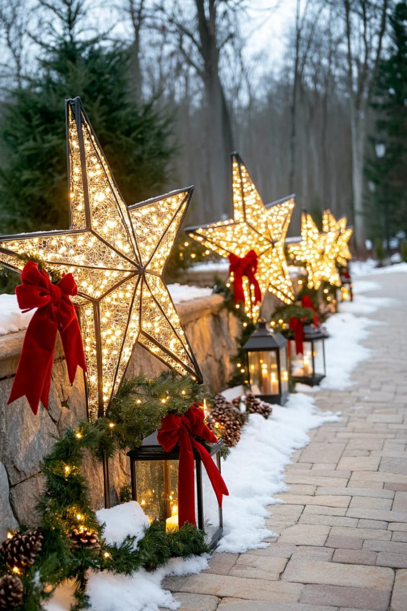 31 Outdoor Christmas Decorations: Ideas for a Magical Welcome 8 enormous star sculptures wrapped in warm white lights lining the walkway 1