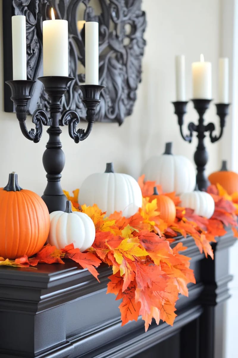 gothic candelabras flanking a garland of orange leaves and tiny white pumpkins 1
