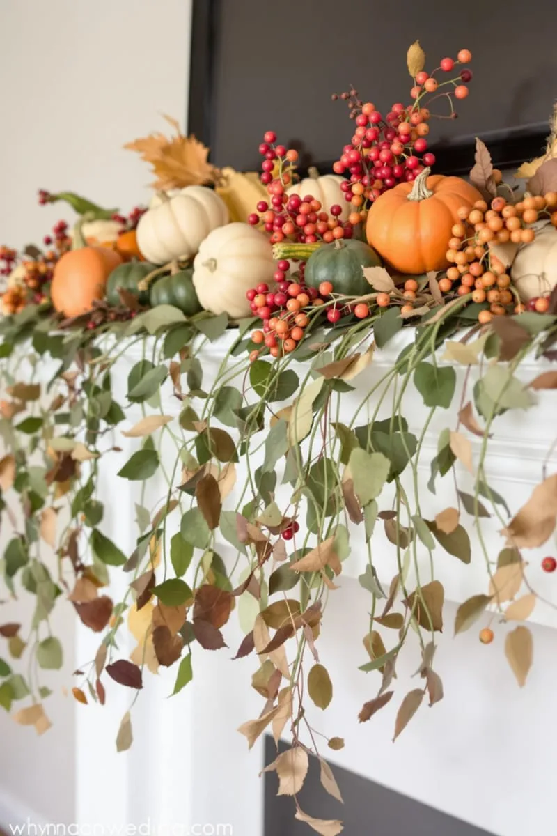 harvest-inspired mantel swag with gourds, berries, and trailing vines 1