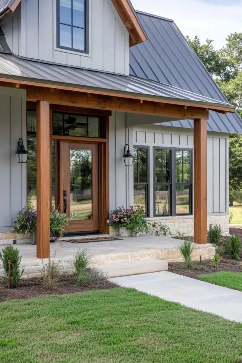 minimalist grey exterior paired with warm wood pillars and trim 1