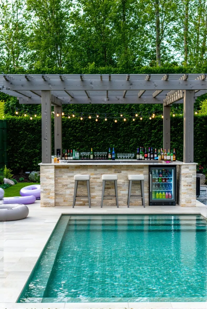 pergola-shaded swim-up bar for backyard pool parties 1