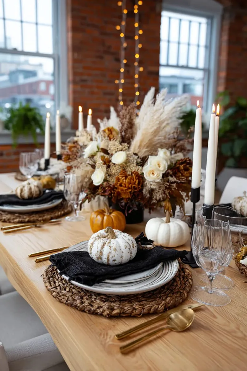 pumpkin and dried flower centerpiece with flickering candles 1