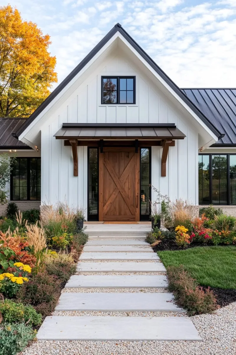 single-story barndominium featuring barn-style sliding doors 1