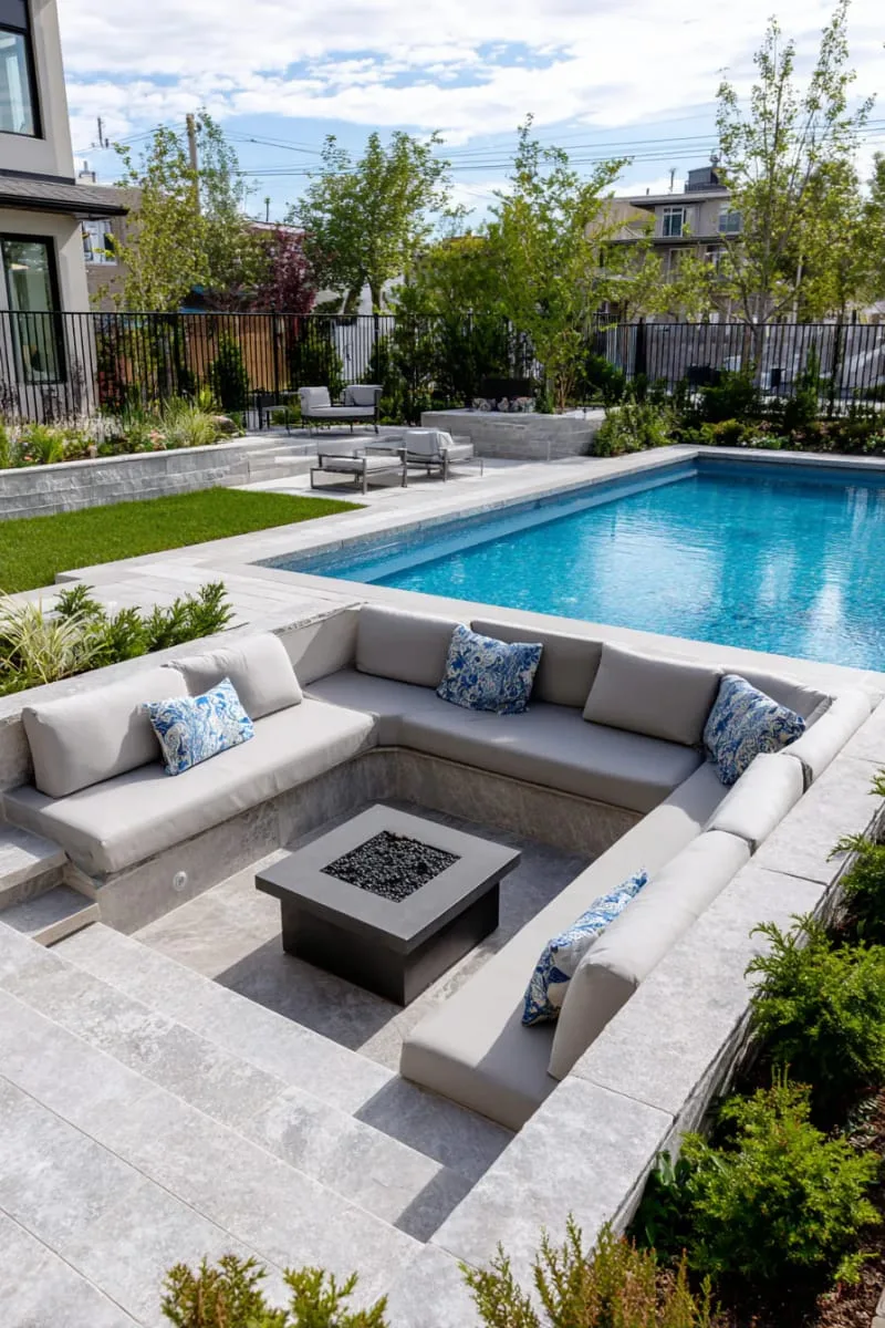 sunken conversation pit with plush seating right next to the pool 1