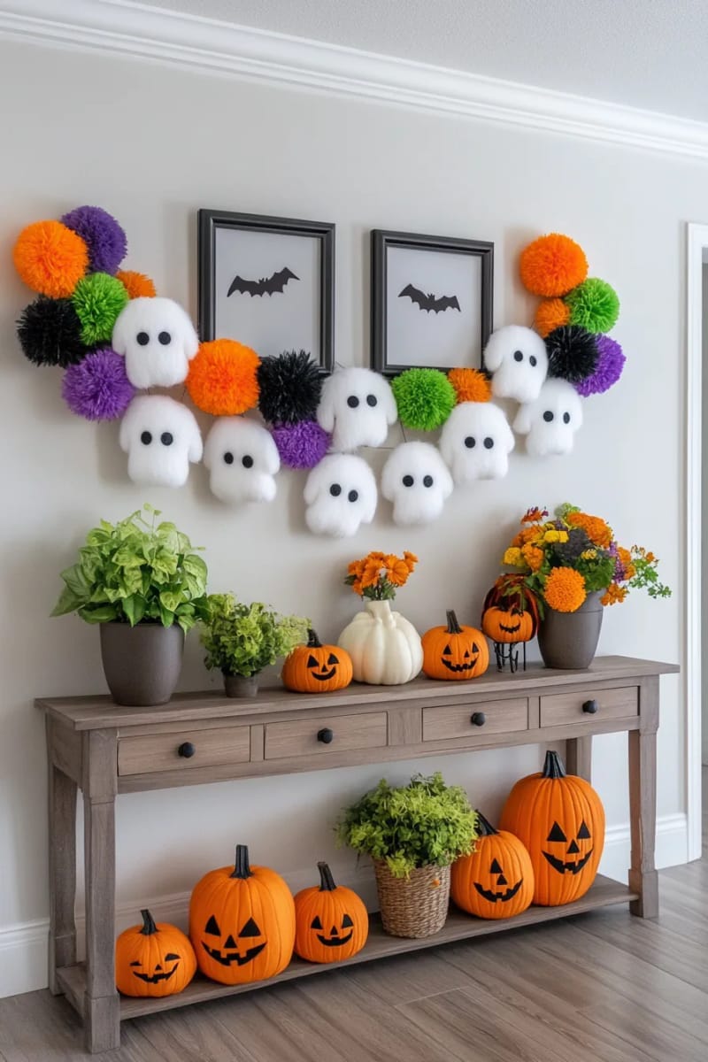 whimsical ghost garland made from felt and pom-poms 1