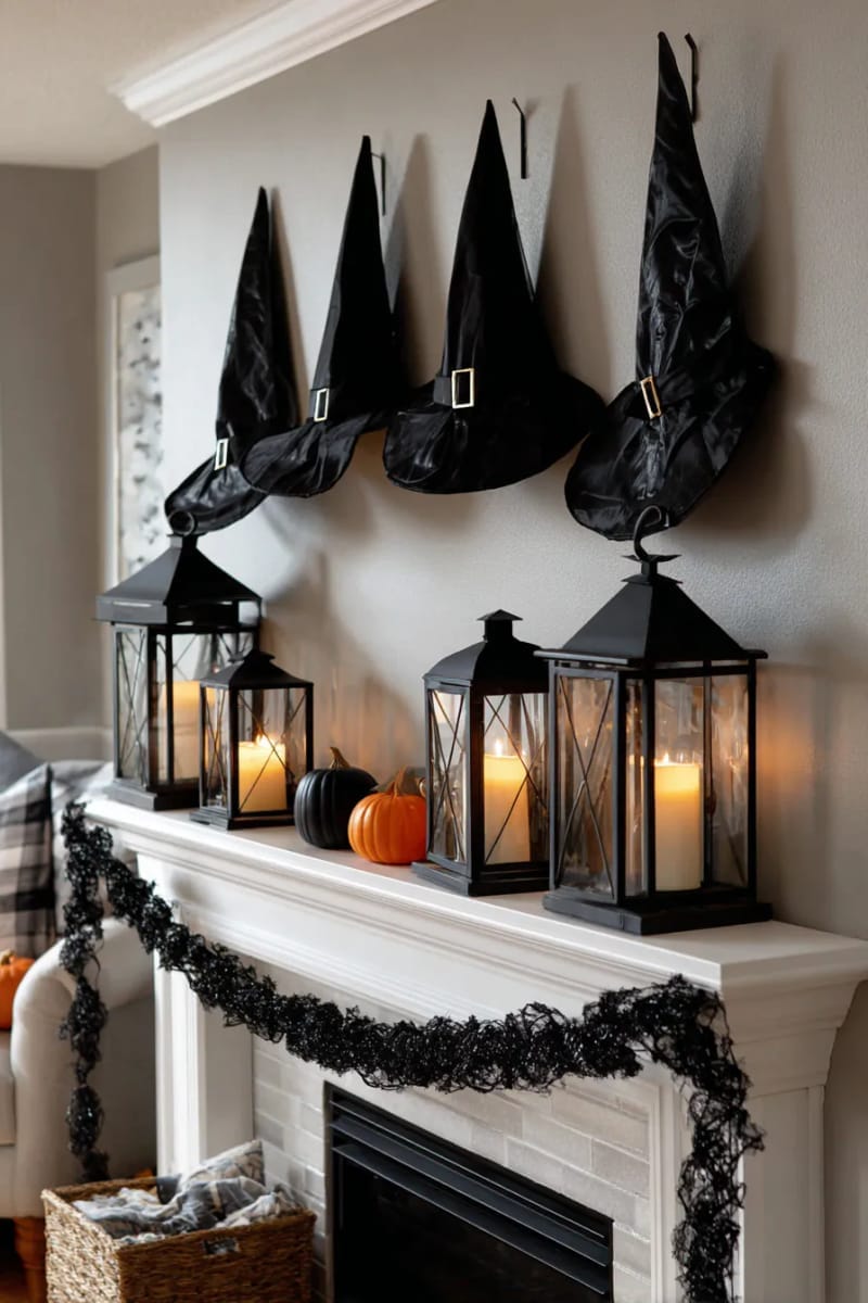witch hats “floating” above the mantle with trailing black garland and lanterns 1