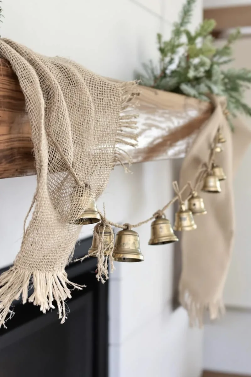 antique sleigh bells on a burlap garland for cozy farmhouse charm 1