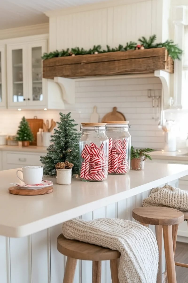 23 Christmas Countertop Decor Ideas Guests Can’t Stop Talking About 40 apothecary jars filled with peppermint candies and pinecones 1