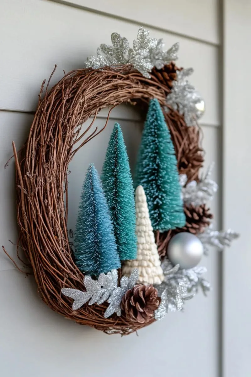 29 Best Christmas Decorations Trends You Can't Miss This Year 124 asymmetrical wreath covered in blue-green bottle brush trees 1