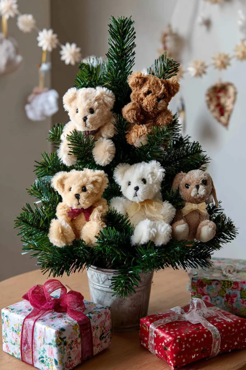 23 Kids Christmas Tree Ideas Full of Color, Whimsy, and Holiday Cheer 14 classic plush animal ornaments hugging the branches of a small child-safe tree 1