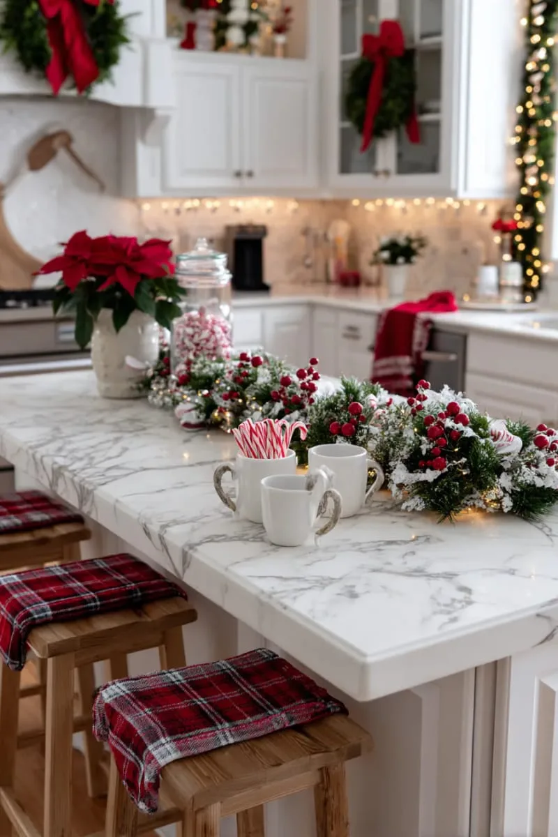 classic red and white berry garland draped across kitchen island counter 1