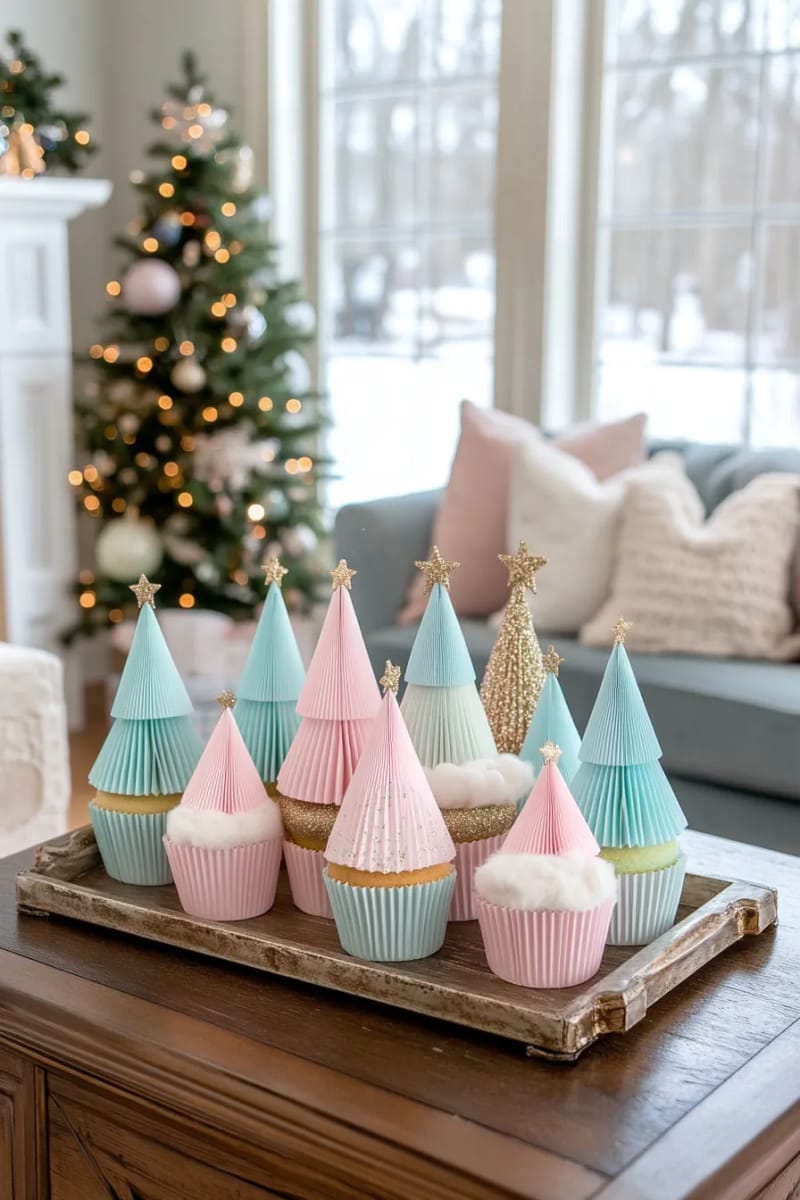 cupcake liner christmas trees decorated with pom-poms and paper stars 1