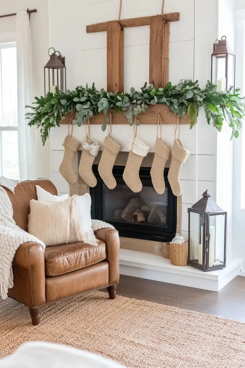 farmhouse-style greenery with burlap stockings and chunky knit blankets 1