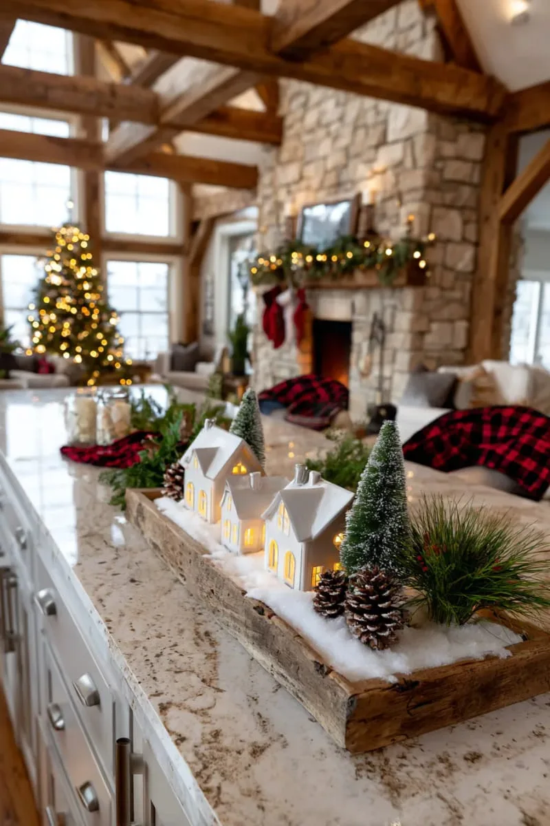 23 Christmas Countertop Decor Ideas Guests Can’t Stop Talking About 88 faux snow-covered tray with tiny houses and twinkling lights 1