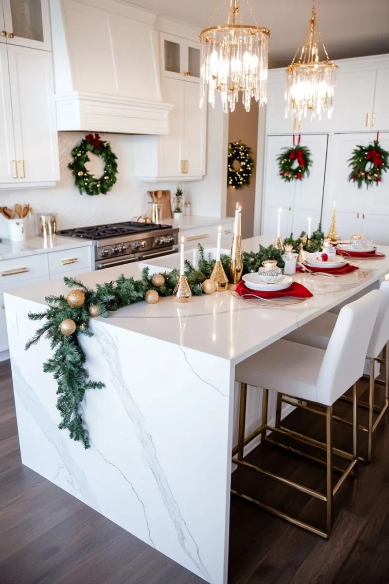 23 Christmas Kitchen Island Decor Ideas That Bring Instant Holiday Charm 18 festive island with gold baubles, greenery, and glowing pillar candles 1