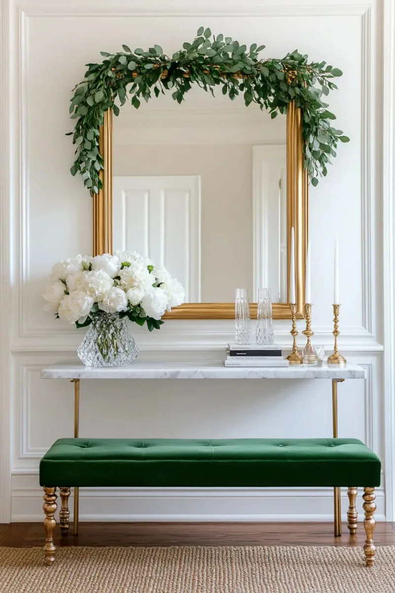 floating garland arch above a mirror for an elegant entryway moment 1