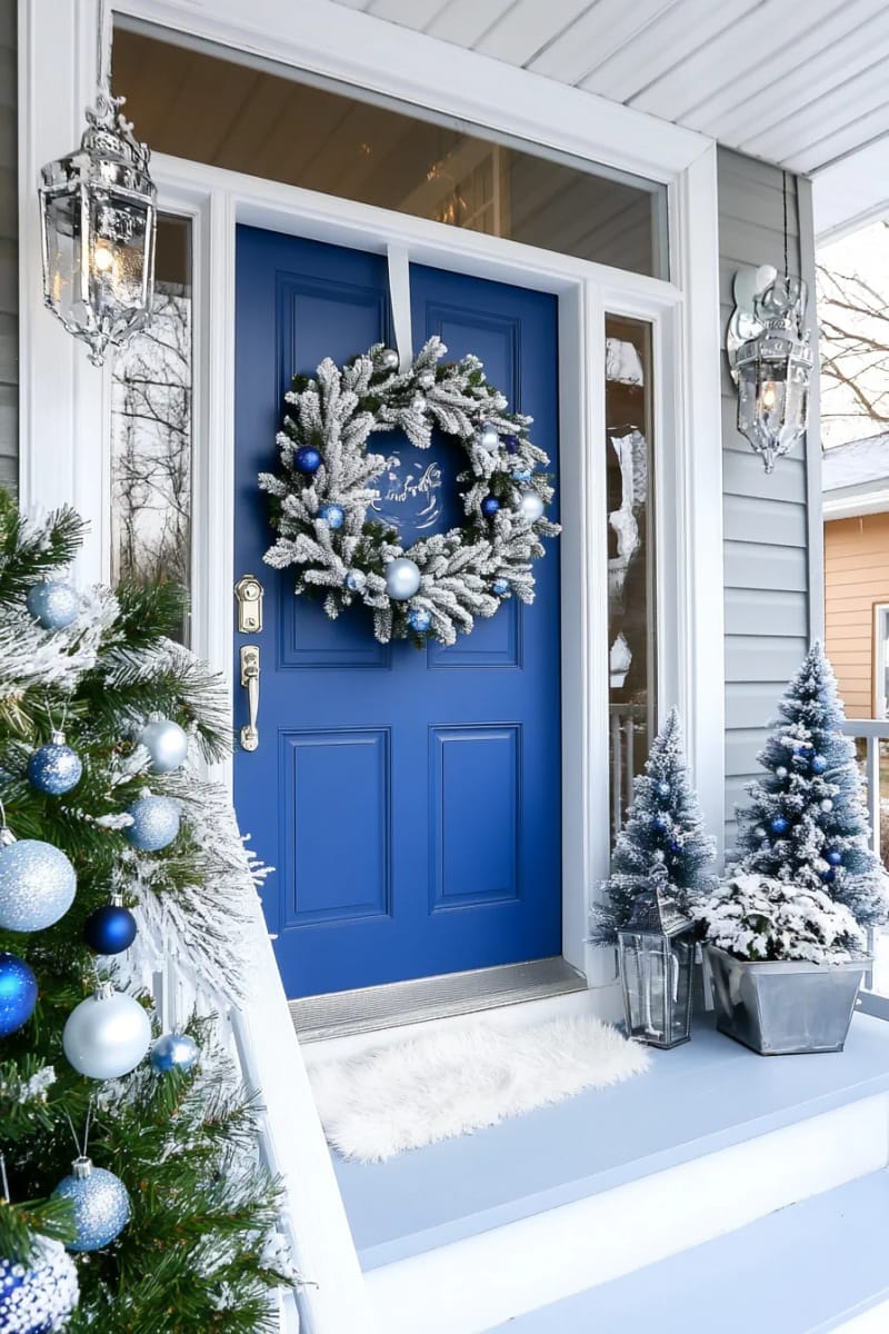 29 Festive Christmas Door Decor Ideas for a Magical Entry 9 frosted blue winter wonderland with snowflake decals and icy wreath 1
