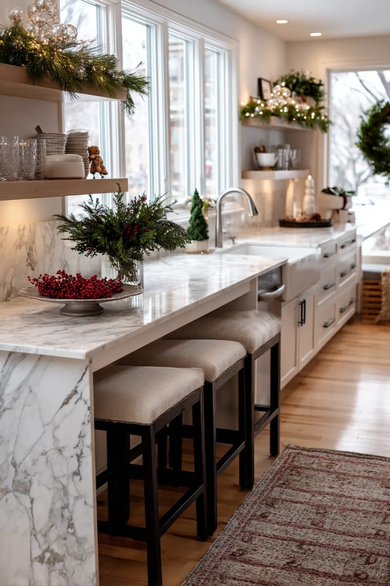frosted pine garland woven through open kitchen shelving 1