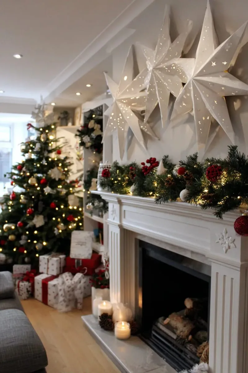 giant paper stars above the mantle with fairy lights woven through 1