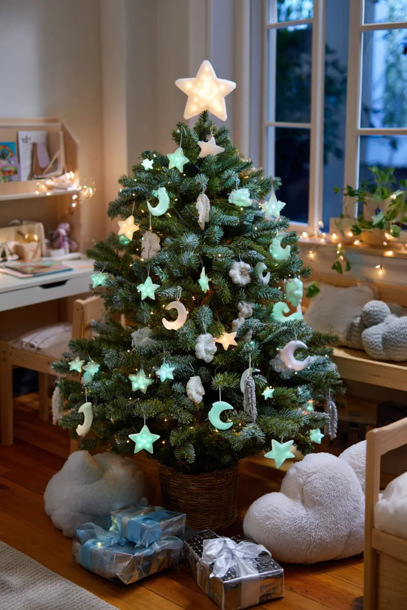 23 Kids Christmas Tree Ideas Full of Color, Whimsy, and Holiday Cheer 50 glow-in-the-dark star and moon ornaments for a magical bedtime kids’ tree 1