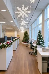 hanging snowflake garlands strung across the ceili 6