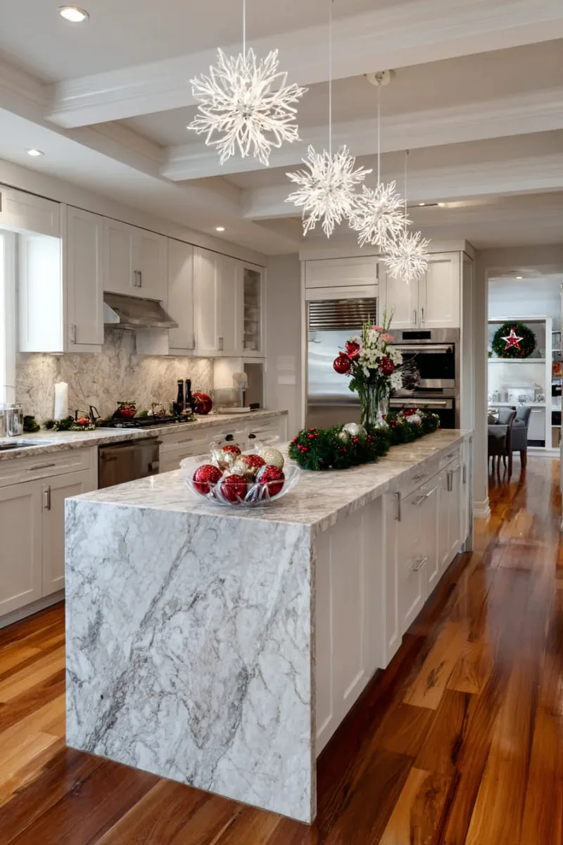 29 Creative Christmas Kitchen Decor Ideas You'll Absolutely Love 19 hanging snowflake ornaments above the kitchen island 1