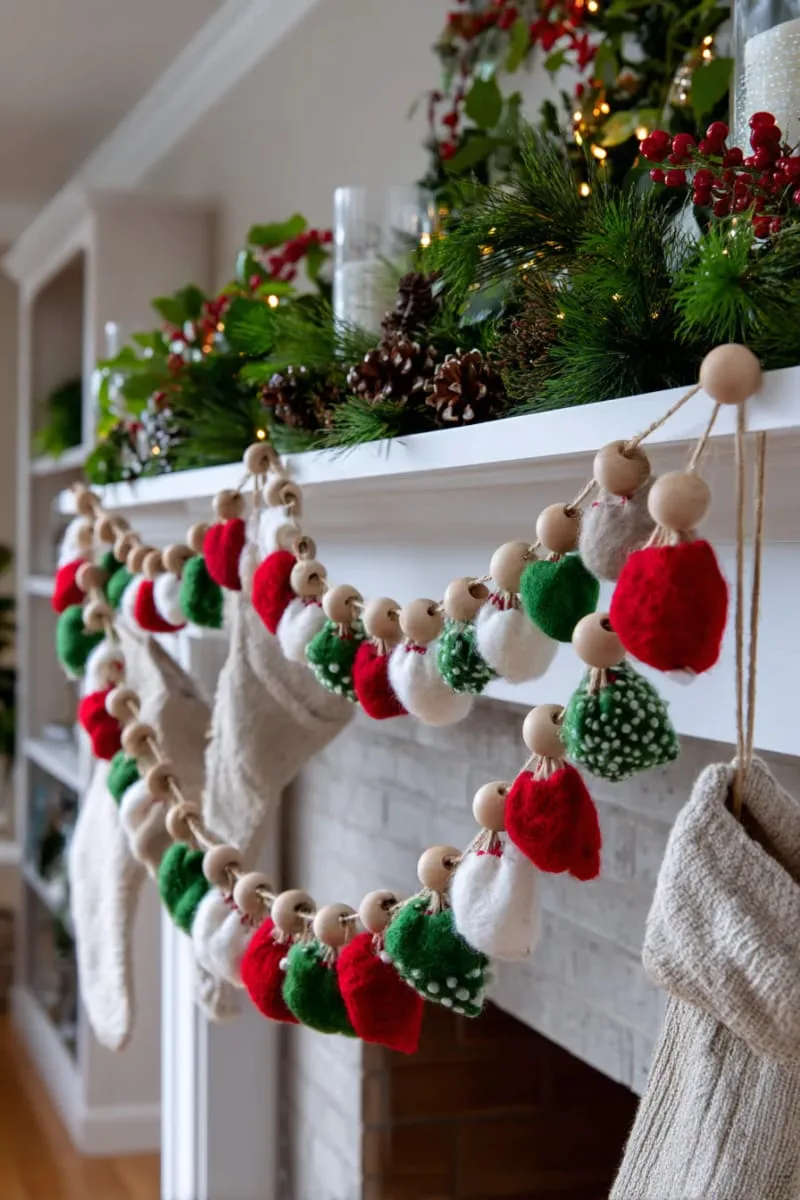 25 Upcycled Christmas Crafts DIY: Unique & Budget Friendly Decor Ideas 87 holiday garland using felted wool sweater scraps and wooden beads 1