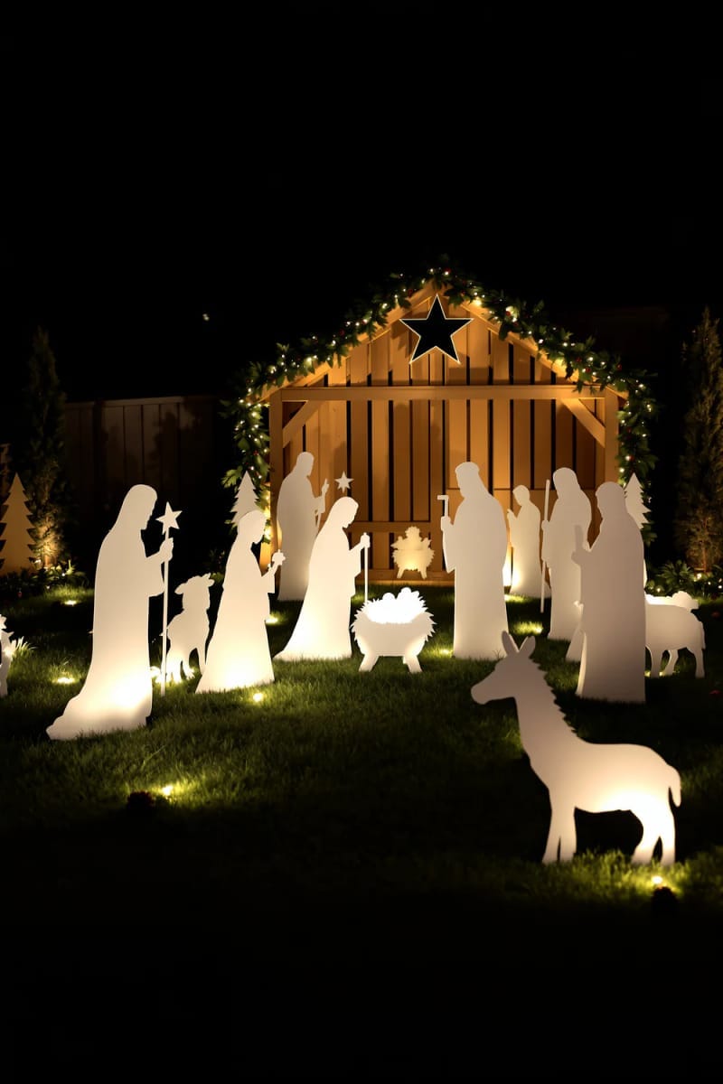 illuminated nativity silhouette scene with plywood cutouts and subtle backlighting 1