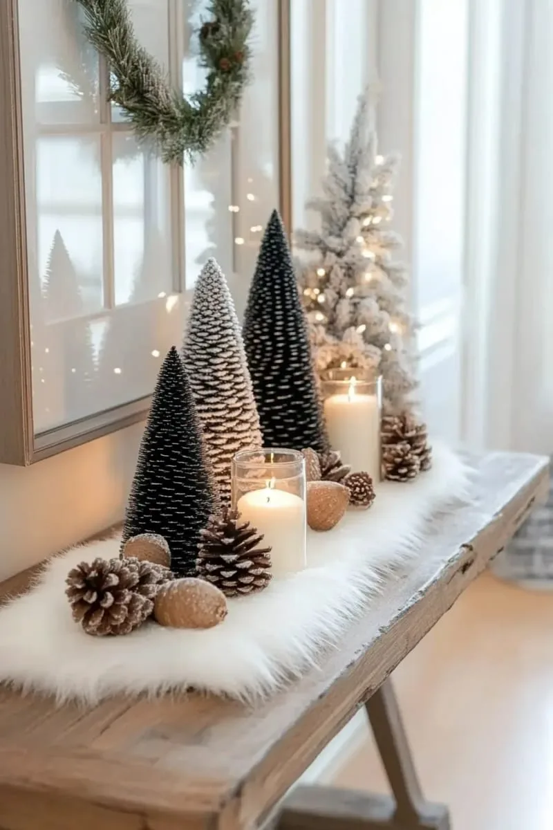 matte black cone trees sprinkled with snowy flocking for a winter forest vignette 1