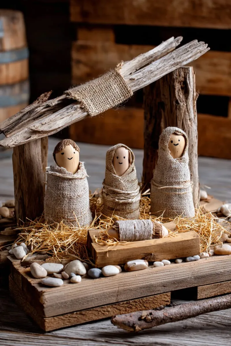 25 Upcycled Christmas Crafts DIY: Unique & Budget Friendly Decor Ideas 115 mini pallet nativity scene with driftwood and burlap details 1