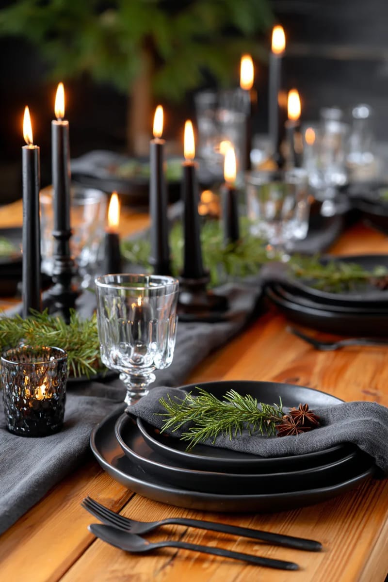 25 Gorgeous Winter Decor Ideas (Not Christmas) for a Serene Home 56 moody winter tablescape with black candles and cedar sprigs 1