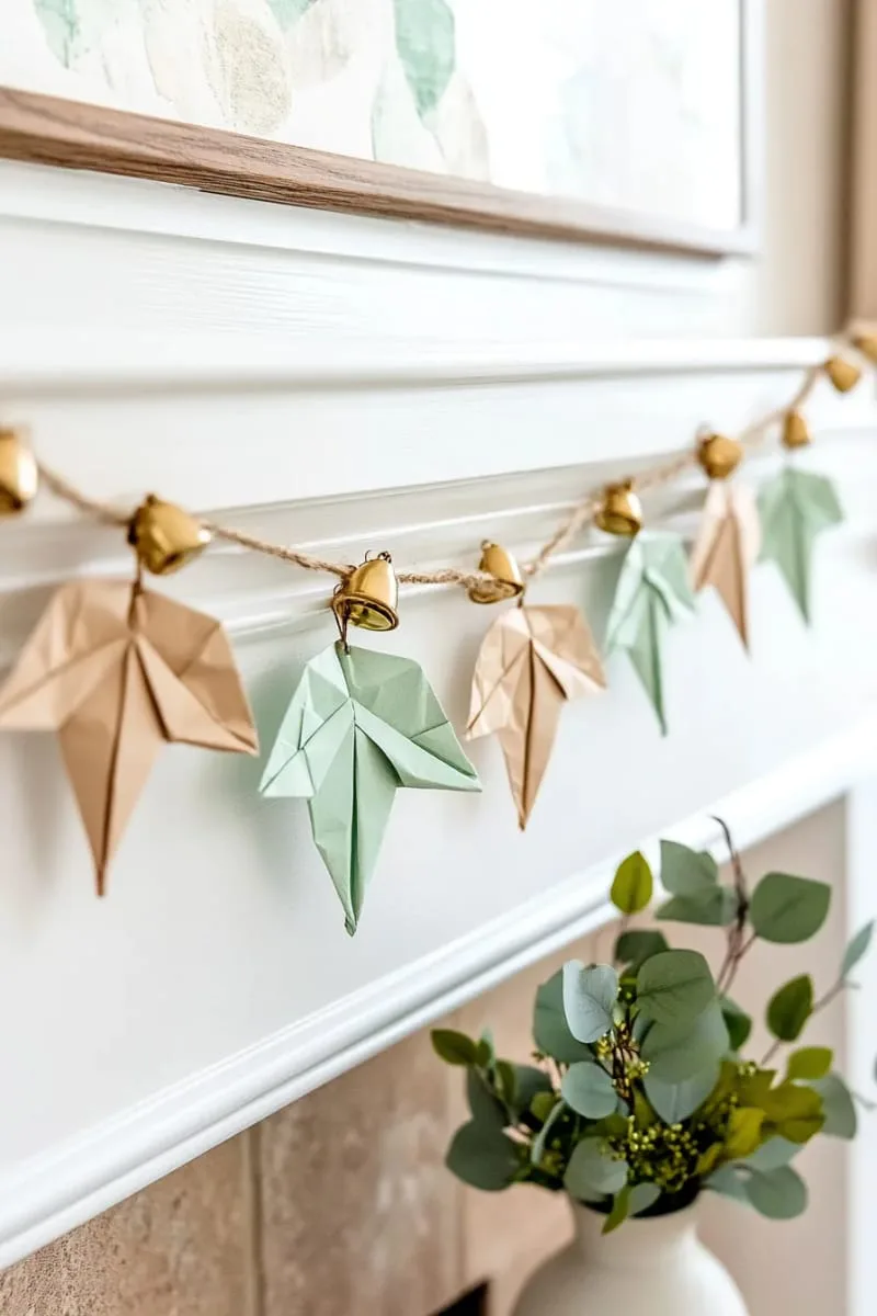 27 Stunning Christmas Decoration Crafts for a Unique 2025 117 origami paper leaves strung together as a festive garland 1