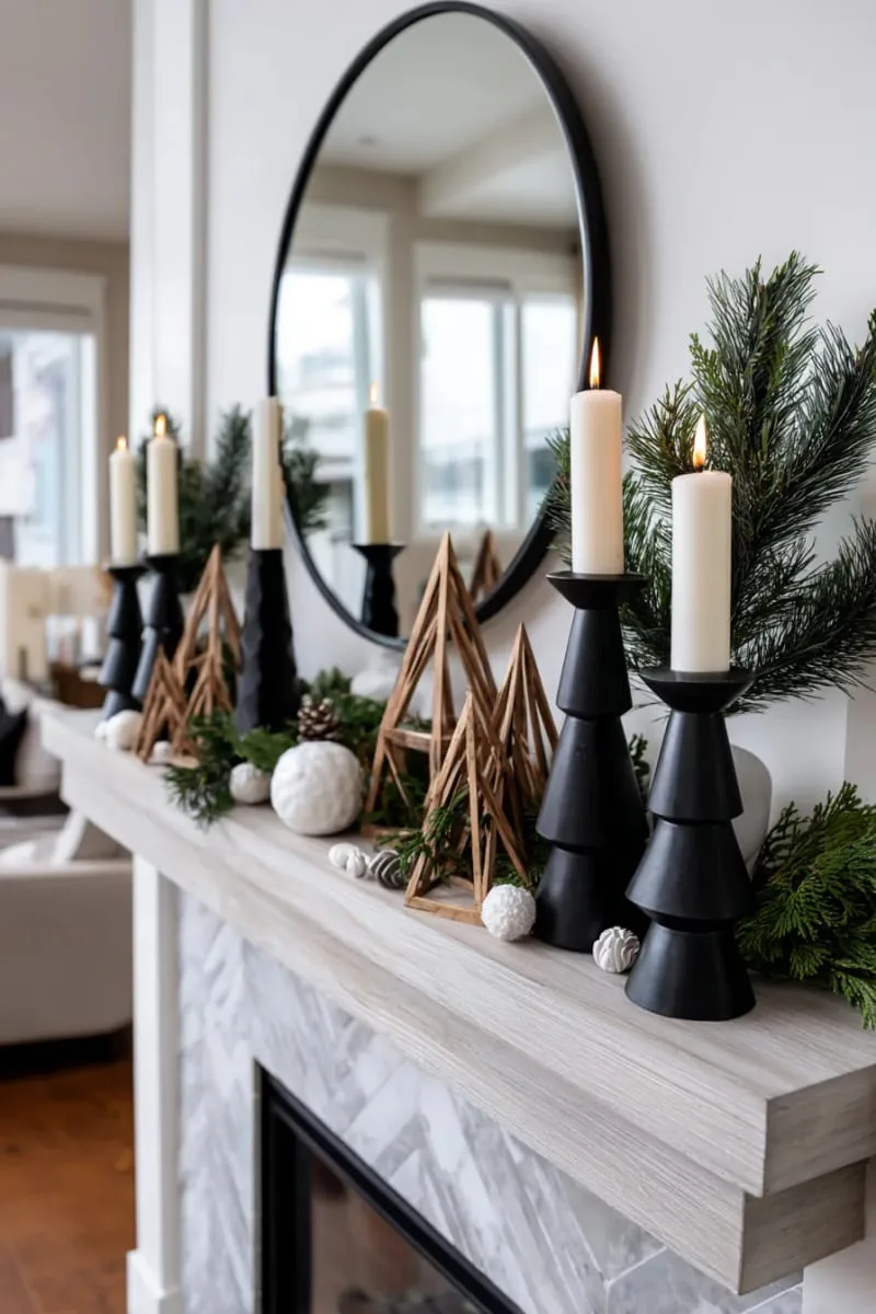 scandinavian black candle holders and geometric black trees on a mantel 1