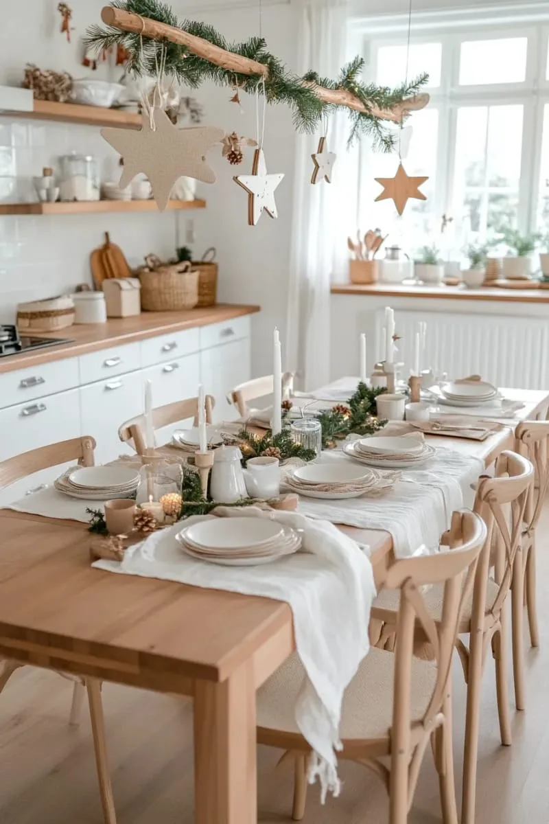 29 Simple Christmas Decor Ideas for a Beautiful Holiday Season 4 scandinavian-inspired branch with hanging wooden ornaments above a dining table 1
