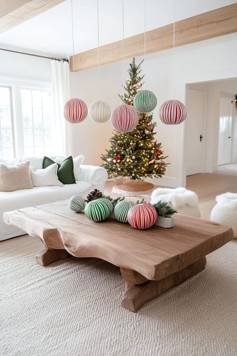 scandinavian-style paper ball ornaments with red, green, and white stripes 1