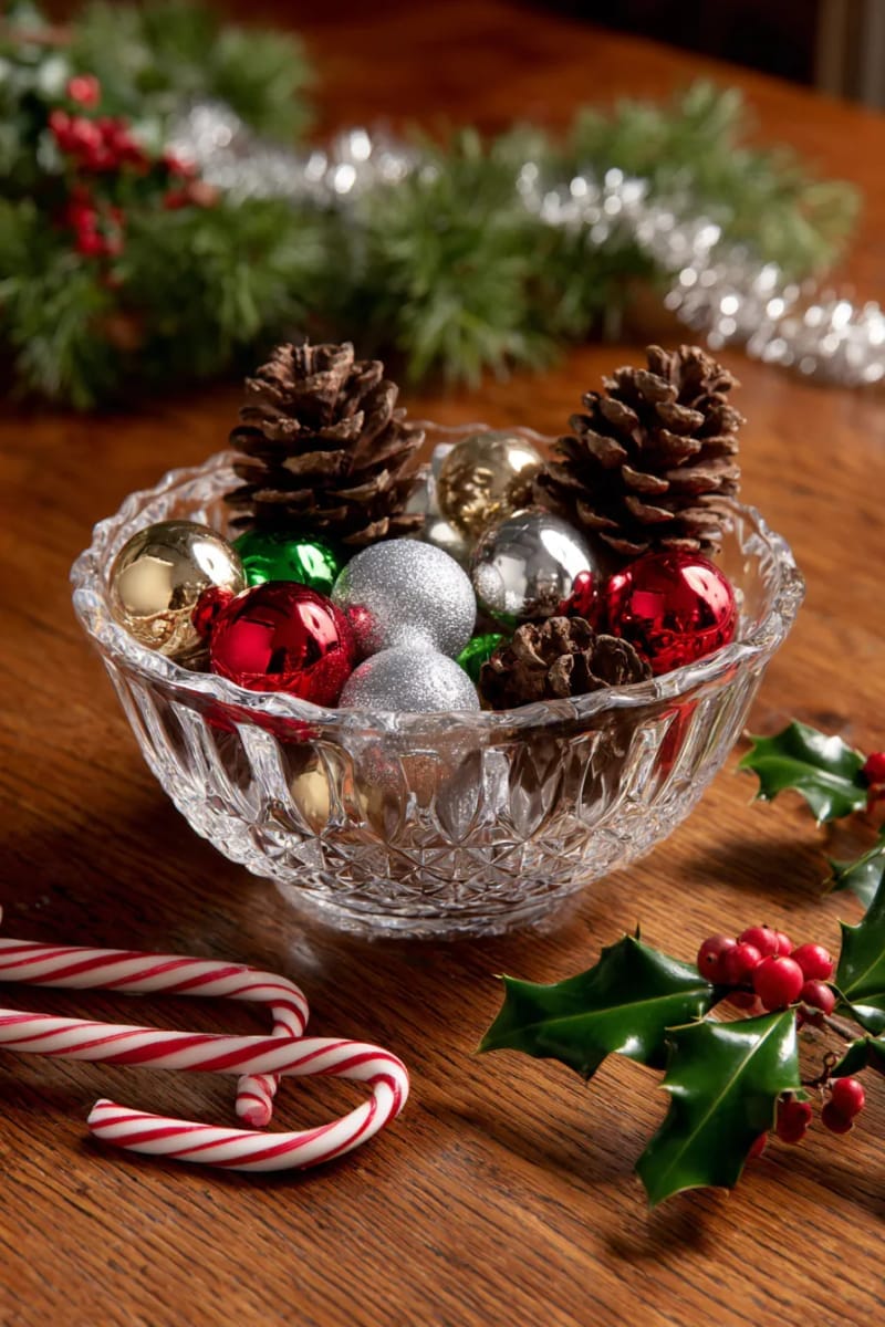 27 Vintage Christmas Decorations You'll Love 11 shimmering glass baubles, pinecones, and candy canes in a vintage punch bowl centerpiece 1