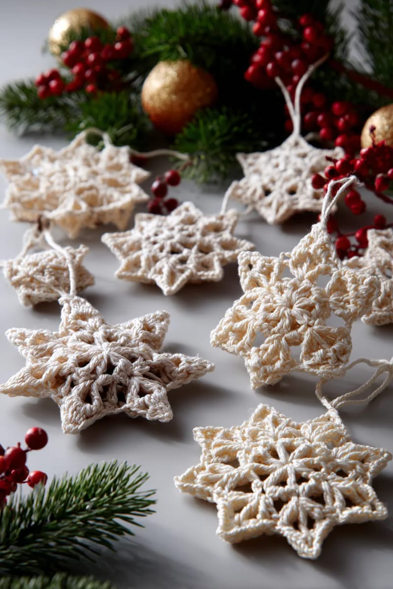 vintage-inspired crochet snowflake ornaments in off-white yarn 1