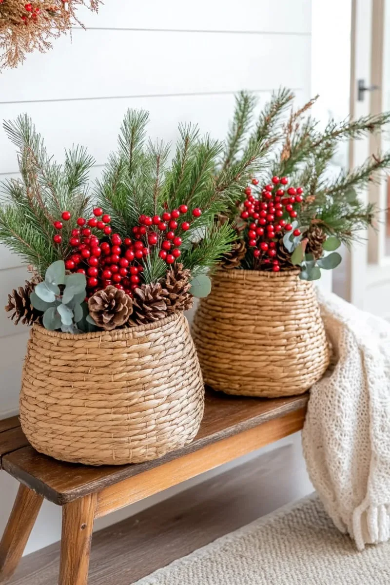 woven seagrass baskets filled with pinecones and greenery 1